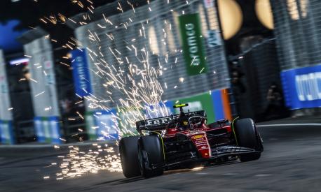 Ferrari driver Carlos Sainz of Spain steers his car during the qualifying session of the Singapore Formula One Grand Prix at the Marina Bay circuit, Singapore, Saturday, Sept. 16, 2023. (AP Photo)