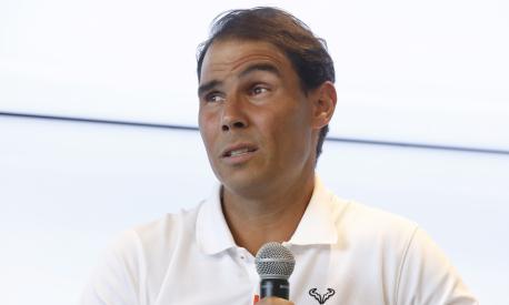 FILE - Spain's Rafael Nadal speaks during a news conference at his tennis academy in Manacor, Mallorca, Spain, Thursday May 18, 2023. Nadal had arthroscopic surgery on Friday, June 2, 2023, for the injured left hip flexor that forced him to sit out the French Open for the first time since he won the first of his record 14 titles there in his 2005 tournament debut. (AP Photo/Francisco Ubilla, File)