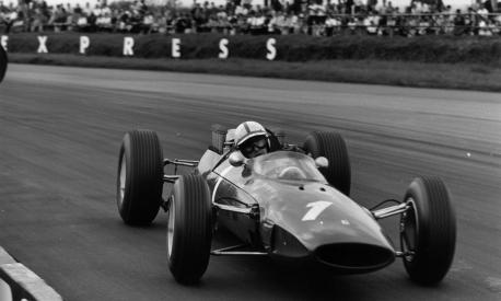 15th May 1965:  Racing driver John Surtees competing in an International Trophy Race in a Ferrari formula one car at Silverstone. Earlier in the day, a loose wheel from a skidding car had deprived him of possible victory in the 75 mile sports car race. He had been disputing the lead with Bruce McLaren at the time.  (Photo by Ted West/Central Press/Getty Images)