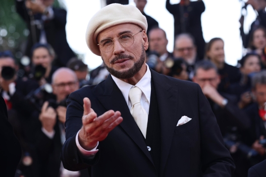 epa12960500 John Travolta attends the premiere of 'Karma' during the 79th annual Cannes Film Festival, in Cannes, France, 15 May 2026. The film festival runs from 12 to 23 May 2026.  EPA/TERESA SUAREZ