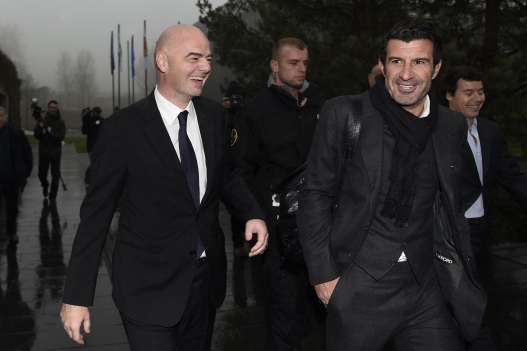 Newly-elected FIFA president Gianni Infantino (L) and former Portuguese international player Luis Figo (R) arrive at the FIFA headquarters on February 29, 2016 in Zurich. Gianni Infantino insisted on February 28, 2016 that FIFA's reform package would close the door on a chapter of pain at world football's governing body and usher in an era of joy. (Photo by VALERIANO DI DOMENICO / AFP)
