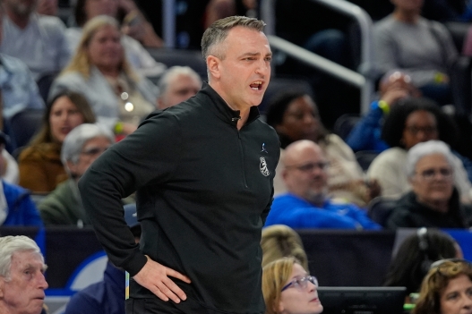 Toronto Raptors head coach Darko Rajakovic shouts to players on the court during the first half of an NBA basketball game against the Orlando Magic, Friday, Jan. 30, 2026, in Orlando, Fla. (AP Photo/John Raoux)