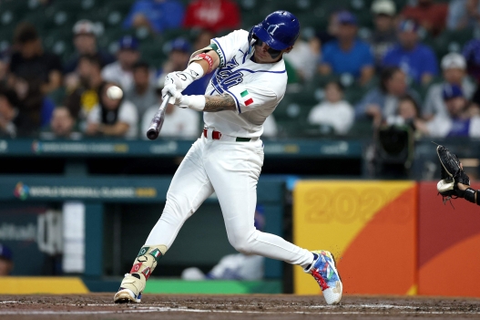 HOUSTON, TEXAS - MARCH 08: Andrew Fischer #11 of the Italy hits a home run in the third inning against Great Britain during the 2026 World Baseball Classic Pool B game between Great Britain and Italy at Daikin Park on March 08, 2026 in Houston, Texas.   Kenneth Richmond/Getty Images/AFP (Photo by Kenneth Richmond / GETTY IMAGES NORTH AMERICA / Getty Images via AFP)
