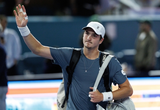 epa12837663 Joao Fonseca of Brazil gestures after being defeated by Carlos Alcaraz of Spain during their Men's Singles Round 2 match at the 2026 Miami Open tennis tournament at the Hard Rock Stadium in Miami, Florida, USA, 20 March 2026.  EPA/CRISTOBAL HERRERA-ULASHKEVICH