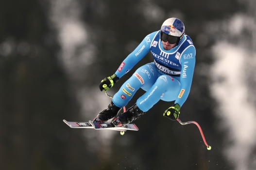 Italy's Dominik Paris speeds down the course, during an alpine ski, men's downhill race, at the Lillehammer World Cup Finals, in Kvitfjell, Norway, Saturday, March 21, 2026. (AP Photo/Gabriele Facciotti)