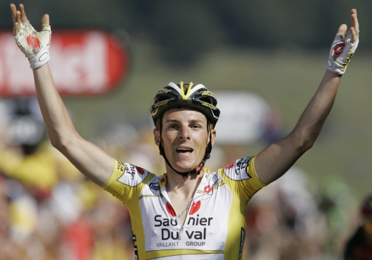 ** FILE ** In this Thursday July 10, 2008 file photo Riccardo Ricco of Italy reacts as he crosses the finish line to win the sixth stage of the Tour de France cycling race between Aigurande and the ski resort of Super-Besse, central France. Cyclist Riccardo Ricco was banned for two years by the Italian Olympic Committee on Thursday after admitting to doping during the Tour de France. (AP Photo/Laurent Rebours, File)