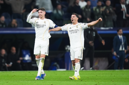 MADRID, SPAIN - MARCH 11: Federico Valverde of Real Madrid celebrates scoring his team's third goal and hat trick with teammate Brahim Diaz during the UEFA Champions League 2025/26 Round of 16 First Leg match between Real Madrid CF and Manchester City FC at Estadio Santiago Bernabeu on March 11, 2026 in Madrid, Spain. (Photo by Angel Martinez/Getty Images)