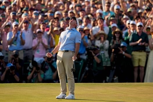 Rory McIlroy, of Northern Ireland, celebrates after winning the Masters golf tournament at the Augusta National Golf Club, Sunday, April 12, 2026, in Augusta, Ga. (AP Photo/Gerald Herbert)