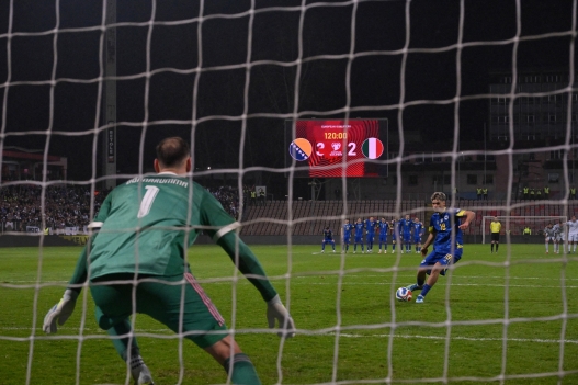 Bosnia-Herzegovina's midfielder #19 Kerim Alajbegovic kicks the ball during the penalty shoot-out during the FIFA World Cup 2026 European qualification final football match between Bosnia-Herzegovina and Italy at the Bilino-Polje stadium in Zenica on March 31, 2026. (Photo by Elvis BARUKCIC / AFP)