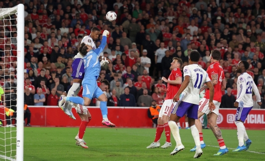 epa12925303 Nottingham Forest's goalkeeper Stefan Ortega (in blue) rejects a ball in front of Aston Villa's Ezri Konsa (L) during the UEFA Europa League semi-finals 1st leg match Nottingham Forest against Aston Villa, in Nottingham, Britain, 30 April 2026.  EPA/ADAM VAUGHAN