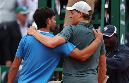 MONTE-CARLO, MONACO - APRIL 12: Jannik Sinner of Italy is congratulated by Carlos Alcaraz of Spain after the Men's Singles Final during day eight of the Rolex Monte-Carlo Masters at Monte-Carlo Country Club on April 12, 2026 in Monte-Carlo, Monaco. (Photo by Julian Finney/Getty Images)
