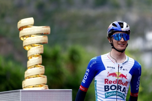 Red Bull - BORA - hansgrohe Italian rider Giulio Pellizzari reacts as he arrives to compete in the 5th stage of the Giro d'Italia 2026 - Tour of Italy cycling race between Praia a Mare and Potenza, southern Italy on May 13, 2026. (Photo by Luca Bettini / AFP)