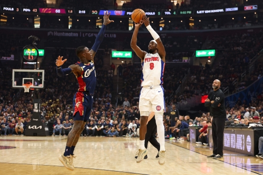  Caris LeVert #8 of the Detroit Pistons shoots the ball against Dennis Schroder #8 of the Cleveland Cavaliers during the third period in Game Six of the Second Round of the NBA Eastern Conference Playoffs at Rocket Arena on May 15, 2026 in Cleveland, Ohio. NOTE TO USER: User expressly acknowledges and agrees that, by downloading and or using this photograph, User is consenting to the terms and conditions of the Getty Images License Agreement.   Gregory Shamus/Getty Images/AFP (Photo by Gregory Shamus / GETTY IMAGES NORTH AMERICA / Getty Images via AFP)