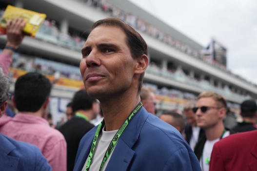 Rafael Nadal stands in the paddock before the Miami Formula One Grand Prix auto race, Sunday, May 3, 2026, in Miami Gardens, Fla. (AP Photo/Rebecca Blackwell)