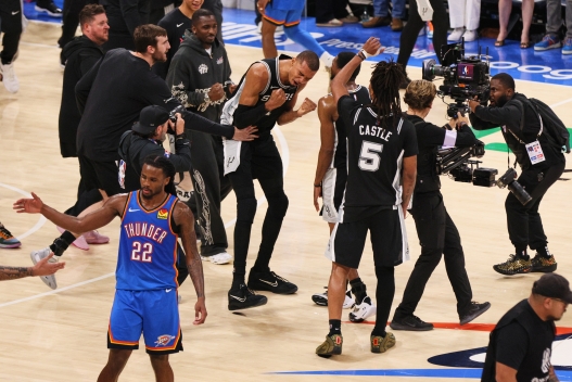 San Antonio Spurs forward Victor Wembanyama celebrates after defeating the Oklahoma City Thunder in the Western Conference finals of the NBA basketball playoffs series Saturday, May 30, 2026, in Oklahoma City. (AP Photo/Nate Billings)