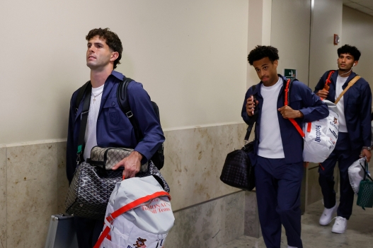 United States' Christian Pulisic, left, Tyler Adams, center and Ricardo Pepi, right arrive with teammates for the World Cup soccer tournament in Santa Ana, Calif., on Saturday, June 6, 2026. (AP Photo/Caroline Brehman)