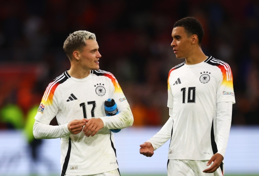  Florian Wirtz interacts with Jamal Musiala of Germany after the UEFA Nations League 2024/25 League A Group A3 match between Netherlands and Germany at Johan Cruijff ArenA on September 10, 2024 in Amsterdam, Netherlands. (Photo by Lars Baron/Getty Images)