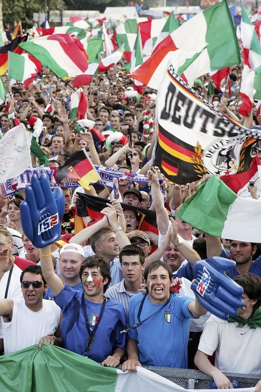  Italy soccer fans celebrate while watching the FIFA World Cup 2006 finals match between France and Italy at the Fan Fest outdoor viewing area July 9, 2006 in Berlin, Germany.    (Photo by Sean Gallup/Getty Images)