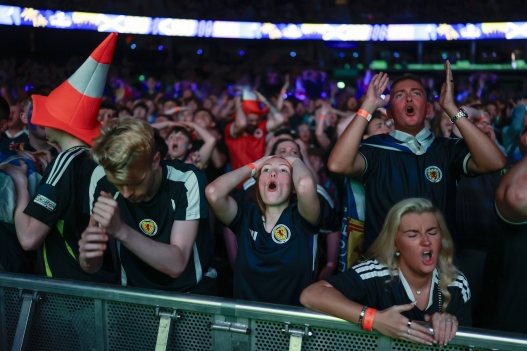  Scotland fans react as they watch the Scotland vs Morocco at The Hydro on June 20, 2026 in Glasgow, Scotland. Scotland face Morocco in their second match of the 2026 FIFA World Cup. This Group C match marks a historic return for the Tartan Army, representing their first World Cup appearance in 28 years (since 1998). (Photo by Jeff J Mitchell/Getty Images) ***BESTPIX***
