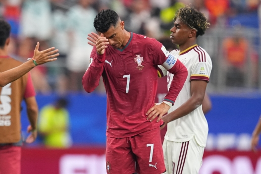 Portugal's Cristiano Ronaldo (7) reacts after the World Cup round of 16 soccer match between Portugal and Spain in Arlington, Texas, near Dallas, Monday, July 6, 2026. (AP Photo/Julio Cortez)
