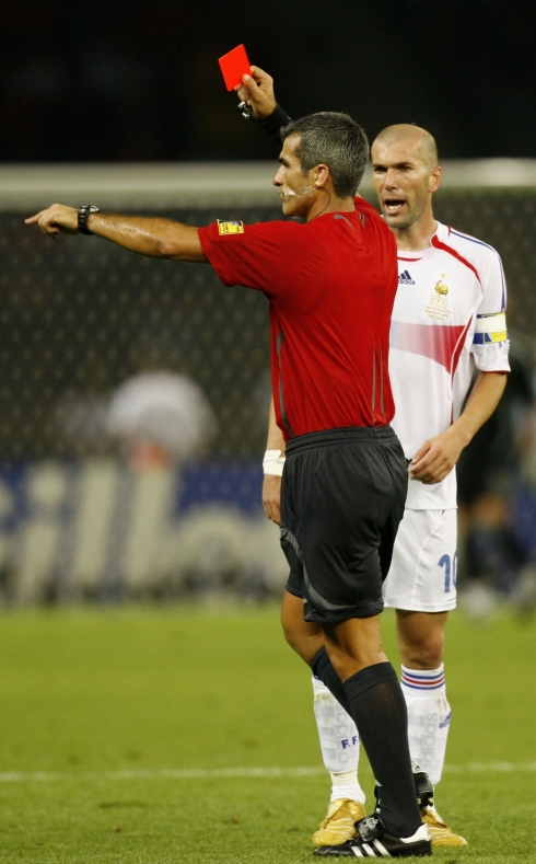 BERLIN - JULY 09: Zinedine Zidane of France is shown the red card by Referee Horacio Elizondo of Argentina during the FIFA World Cup Germany 2006 Final match between Italy and France at the Olympic Stadium on July 9, 2006 in Berlin, Germany. (Photo by Michael Steele/Getty Images)
