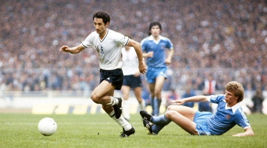  Spurs player Osvaldo Ardiles skips the challenge of Man City defender Tommy Caton during the 1981 FA Cup Final replay between Tottenham Hotspur and Manchester City at Wembley Stadium on May 9, 1981 in London, England,  (Photo by Duncan Raban/Allsport/Getty Images)