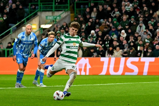 Celtic's Belgian midfielder #27 Arne Engels scores the team's third goal from the penalty spot during the UEFA Europa League league-stage football match between Celtic and FC Utrecht at Celtic Park in Glasgow on January 29, 2026. (Photo by ANDY BUCHANAN / AFP)