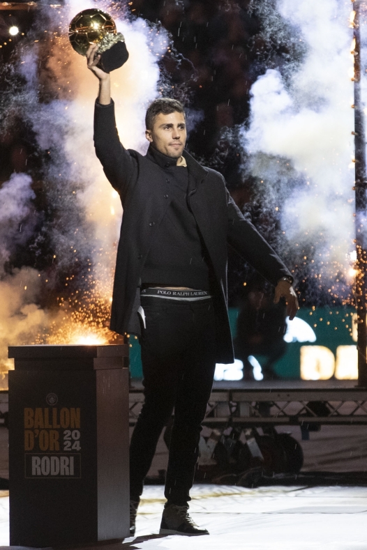 Rodri #16 of Manchester City F.C. participates in the presentation of the Ballon d'Or during the Premier League match between Manchester City and Tottenham Hotspur at the Etihad Stadium in Manchester, on November 23, 2024. (Photo by MI News/NurPhoto) (Photo by MI News / NurPhoto via AFP)