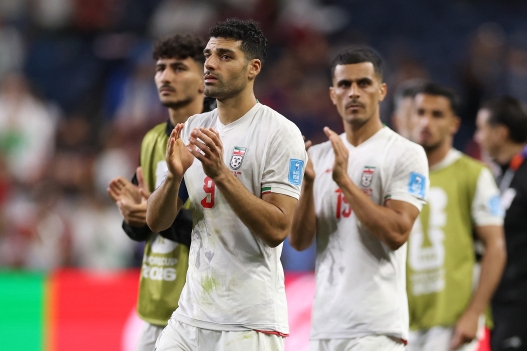  Mehdi Taremi #9 of IR Iran applauds fans after the 1-1 draw during the FIFA World Cup 2026 Group G match between Egypt and IR Iran at Seattle Stadium on June 26, 2026 in Seattle, Washington.   Richard Heathcote/Getty Images/AFP (Photo by Richard HEATHCOTE / GETTY IMAGES NORTH AMERICA / Getty Images via AFP)