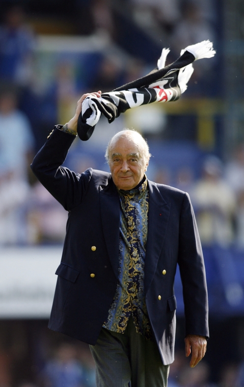Fulham's Chairman Mohamed Al Fayed celebrates at the end of the team's Premier League match against Portsmouth at Fratton Park, in Portsmouth, on May 11, 2008. Fulham won the match 1-0. AFP PHOTO/GLYN KIRK --- Mobile and website use of domestic English football pictures are subject to obtaining a Photographic End User Licence from Football DataCo Ltd Tel : +44 (0) 207 864 9121 or e-mail accreditations@football-dataco.com - applies to Premier and Football League matches (Photo by GLYN KIRK / AFP)