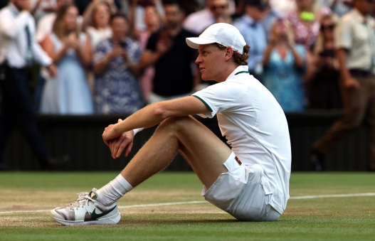 epa13107505 Jannik Sinner of Italy celebrates winning the Men's Singles final against Alexander Zverev of Germany at the Wimbledon Championships in London, Britain, 12 July 2026.  EPA/NEIL HALL
