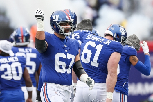  Justin Pugh #67 of the New York Giants gestures prior to a game against the New England Patriots at MetLife Stadium on November 26, 2023 in East Rutherford, New Jersey.   Elsa/Getty Images/AFP (Photo by ELSA / GETTY IMAGES NORTH AMERICA / Getty Images via AFP)