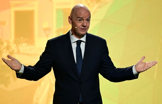 (FILES) FIFA President Gianni Infantino speaks during the unveiling ceremony for the logo of the 2027 FIFA Women's World Cup in Rio de Janeiro, Brazil on January 25, 2026. FIFA president Gianni Infantino has lost the "confidence" of the UEFA, European football's governing body, it said in a statement on August 1, 2026, after his plan to allow private investment in the World Cup was withdrawn following a global backlash. (Photo by Pablo PORCIUNCULA / AFP)