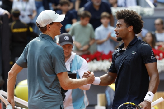 epa12926831 Jannik Sinner (L) of Italy celebrates after winning his men's singles semifinal match against Arthur Fils (R) of France at the Madrid Open tennis tournament in Madrid, Spain, 01 May 2026. EPA/CHEMA MOYA