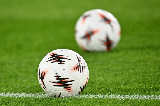 Official balls are present during the UEFA Europa League phase day 5 football match between A.S. Roma and F.C. Midtjylland at the Olympic Stadium in Rome, Italy, on November 27, 2025. (Photo by Domenico Cippitelli/NurPhoto) (Photo by Domenico Cippitelli / NurPhoto via AFP)