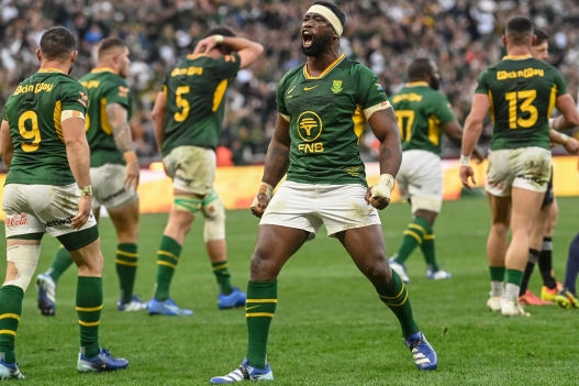TOPSHOT - South Africa's flanker Siya Kolisi celebrates after scoring a try during the second Rugby's Greatest Rivalry international rugby union match between South Africa and New Zealand at the Cape Town Stadium in Cape Town, on August 29, 2026. (Photo by Rodger Bosch / AFP)