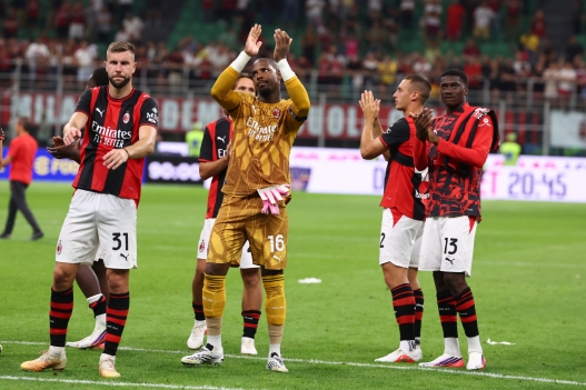 MILAN, ITALY - AUGUST 28: Strahinja Pavlovic, Mike Maignan, Sankhoun Diawara of AC Milan and teammates celebrate the victory after the Serie A match between AC Milan and Venezia FC at Stadio Giuseppe Meazza on August 28, 2026 in Milan, Italy. (Photo by Giuseppe Cottini/AC Milan via Getty Images)