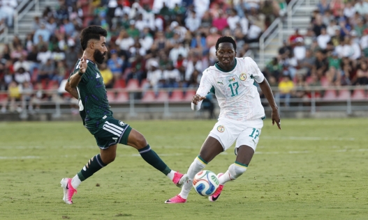 SAN ANTONIO, TX -JUNE 9: Hassan Kadish #13 of Saudi Arabia reacts to Pape Matar Sarr #17 of Senegal in the second half of the international friendly match between Saudi Arabia and Senegal on June 9, 2026 at Toyota Field in San Antonio, Texas. Ronald Cortes/Getty Images/AFP (Photo by Ronald Cortes / GETTY IMAGES NORTH AMERICA / Getty Images via AFP)