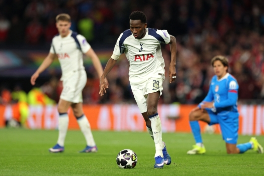 Tottenham Hotspur's Senegalese forward #29 Pape Matar Sarr runs with the ball during the UEFA Champions League round of 16 second leg football match between Tottenham Hotspur and Atletico Madrid at the Tottenham Hotspur Stadium in London, on March 18, 2026. (Photo by Adrian Dennis / AFP)