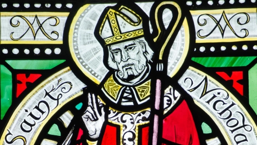 A Victorian stained glass window depicting Saint Nicholas.  Over 100 years old.