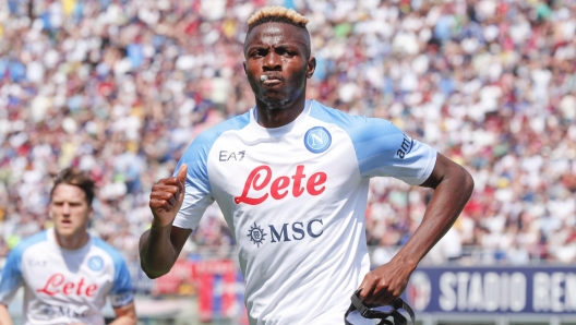 Napoli's Victor Osimhen jubilates with his teammates after scoring the goal  during the Italian Serie A soccer match Bologna FC vs  SSC Napoli at Renato Dall'Ara stadium in Bologna, Italy, 28 May 2023. ANSA /ELISABETTA BARACCHI