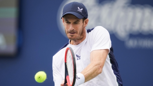 Britain's Andy Murray returns a shot to Italy's Lorenzo Sonego at the National Bank Open men's tennis tournament in Toronto, Tuesday, Aug. 8, 2023. (Mark Blinch/The Canadian Press via AP)