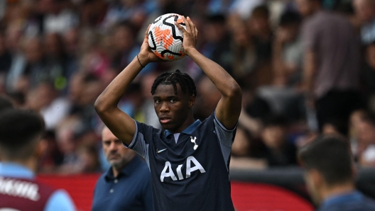 Tottenham Hotspur's Italian defender #38 Destiny Udogie prepares to take a throw-in during the English Premier League football match between Burnley and Tottenham Hotspur at Turf Moor in Burnley, north-west England on September 2, 2023. (Photo by Paul ELLIS / AFP) / RESTRICTED TO EDITORIAL USE. No use with unauthorized audio, video, data, fixture lists, club/league logos or 'live' services. Online in-match use limited to 120 images. An additional 40 images may be used in extra time. No video emulation. Social media in-match use limited to 120 images. An additional 40 images may be used in extra time. No use in betting publications, games or single club/league/player publications. /