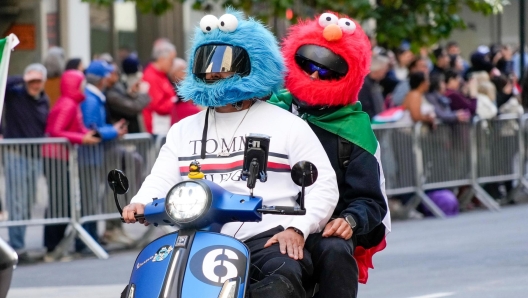 epa10910396 Participants ride a Vespa during the 79th Annual Columbus Day Parade in New York, USA, 09 October 2023. The parade celebrates Italian-American culture as well as the anniversary of Christopher Columbus's arrival in the Americas in 1492.  EPA/PORTER BINKS