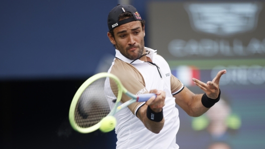 Matteo Berrettini, of Italy, returns a ball to Gregoire Barrere, of France, during the first day of the National Bank Open men's tennis tournament in Toronto, Monday, Aug. 7, 2023. (Cole Burston/The Canadian Press via AP)