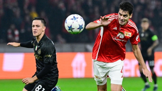 Union Berlin's Portuguese defender #04 Diogo Leite (R) and Napoli's Italian forward #81 Giacomo Raspadori vie for the ball during the UEFA Champions League group C football match 1 FC Union Berlin v SSC Napoli at the Olympic Stadium in Berlin on October 24, 2023. (Photo by John MACDOUGALL / AFP)