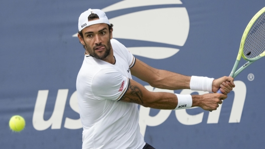 Matteo Berrettini, of Italy, returns a shot to Ugo Humbert, of France, during the first round of the U.S. Open tennis championships, Tuesday, Aug. 29, 2023, in New York. (AP Photo/Mary Altaffer)