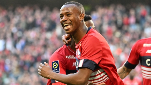 Lille's Portuguese defender Tiago Djalo celebrates scoring his team's first goal during the French L1 football match between LOSC Lille and Angers SCO at the Pierre Mauroy stadium in Villeneuve-d'Ascq on November 13, 2022. (Photo by DENIS CHARLET / AFP)