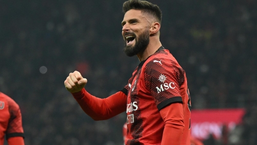 MILAN, ITALY - JANUARY 14:  Olivier Giroud of AC Milan celebrates  after scoring the goal during the Serie A TIM match between AC Milan and AS Roma - Serie A TIM  at Stadio Giuseppe Meazza on January 14, 2024 in Milan, Italy. (Photo by Claudio Villa/AC Milan via Getty Images)