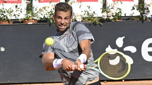 Stefano Napolitano of Italy in action against Shang Juncheng of China (not pictured) during their men's singles match at the Italian Open tennis tournament in Rome, Italy, 11 May 2024. ANSA/ALESSANDRO DI MEO